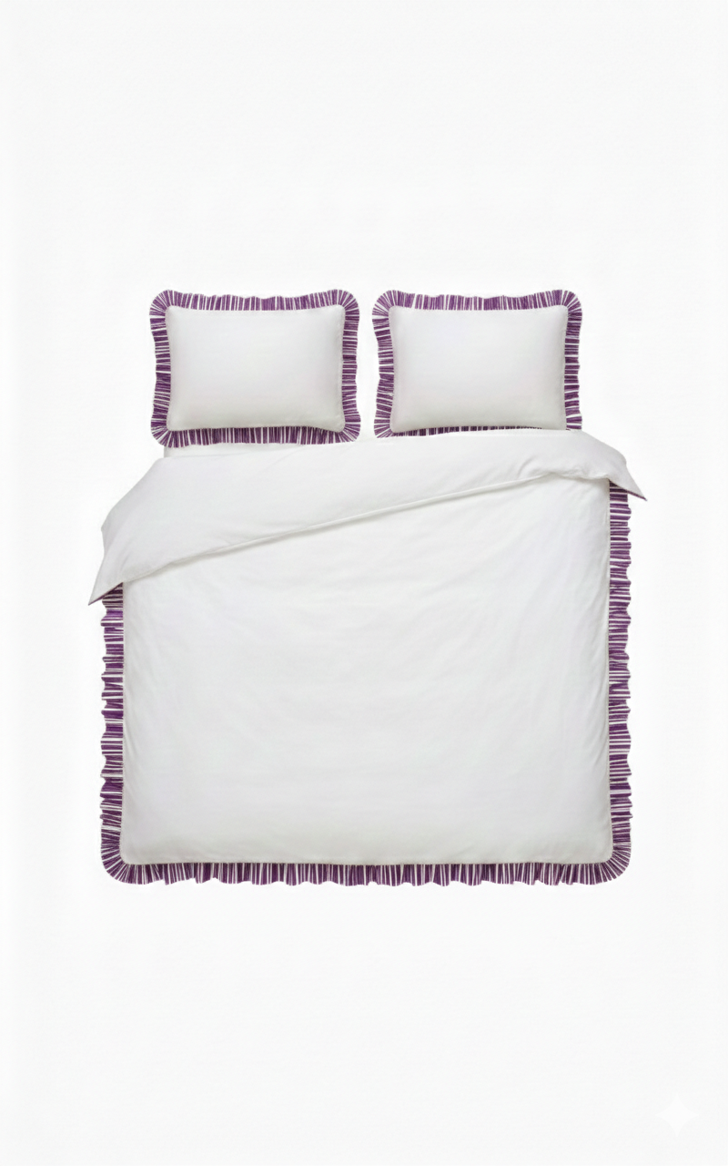White duvet set with purple trim on a white background