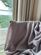 pink and blue chevron throw on a chair 