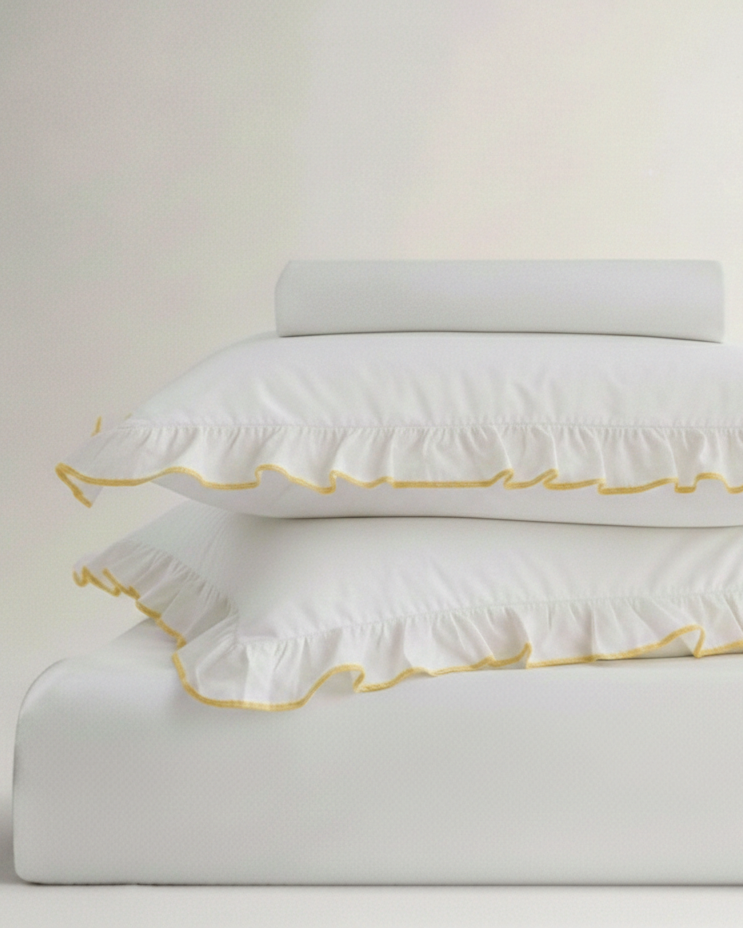 bedding bundle with yellow frill 